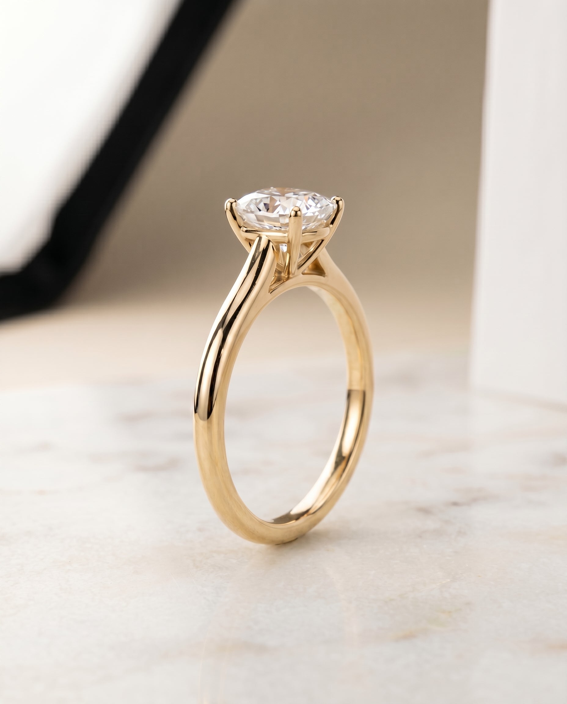 Pinched Cathedral Solitaire Cut styling on The Gladys cushion engagement ring setting | RockHer