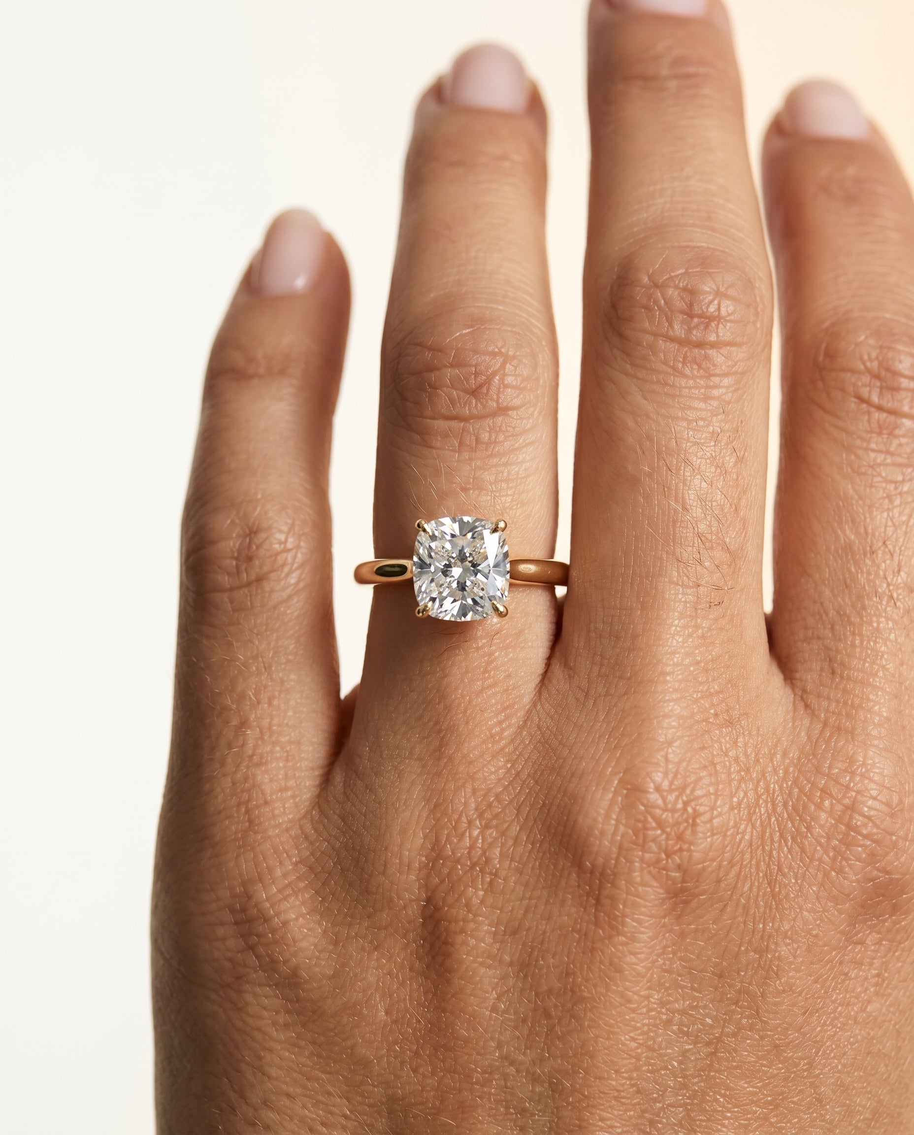 The Gladys engagement ring setting in 18K Yellow Gold, pinched cathedral solitaire cut design | RockHer