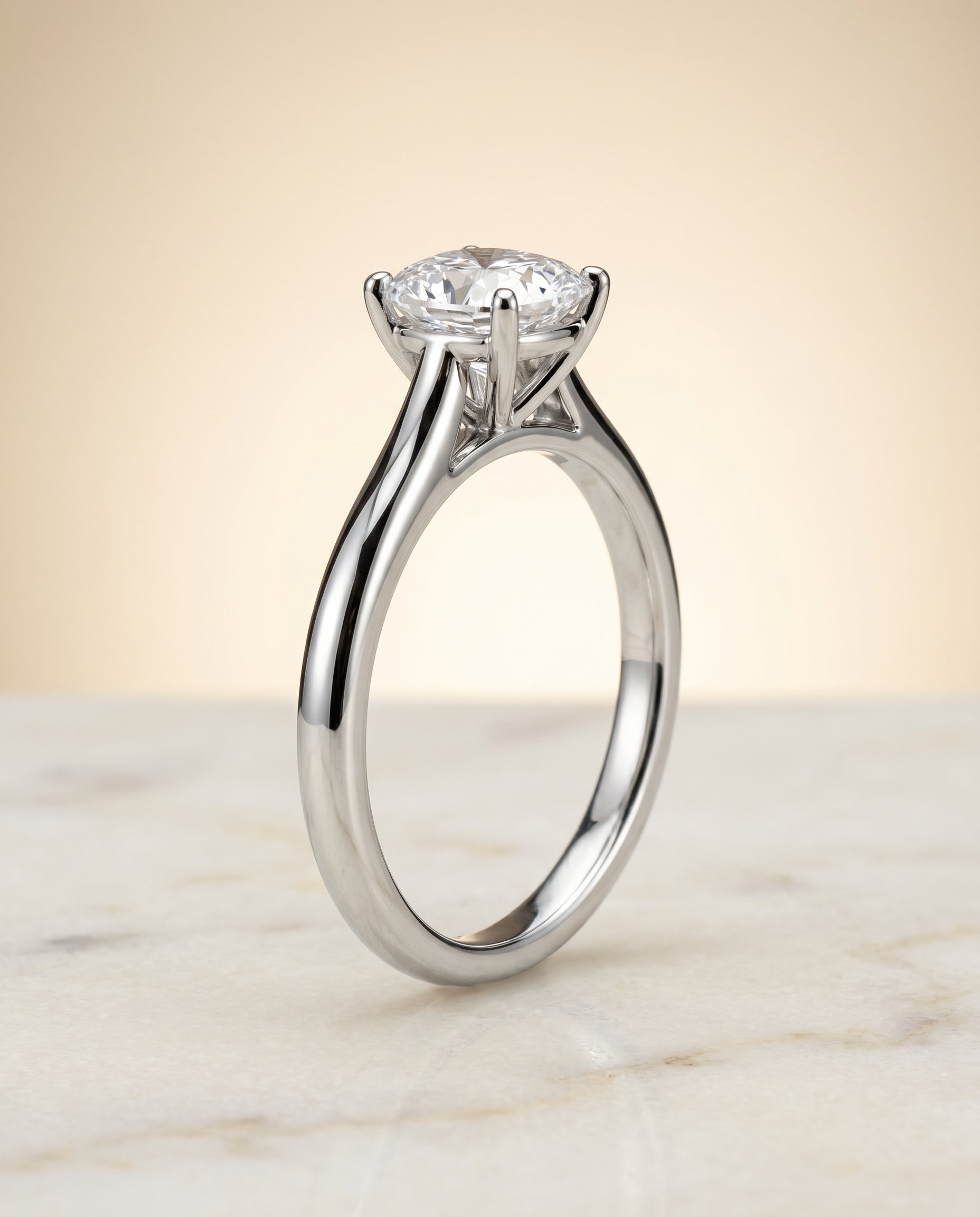 Pinched Cathedral Solitaire Cut styling on The Gladys cushion engagement ring setting | RockHer