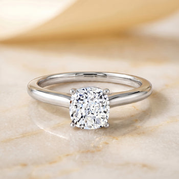 The Gladys Pinched Cathedral Solitaire Cushion Cut Engagement Ring Setting in Platinum