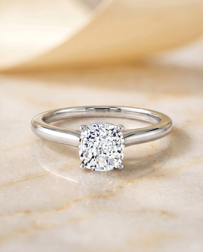 The Gladys Pinched Cathedral Solitaire Cushion Cut Engagement Ring Setting in Platinum