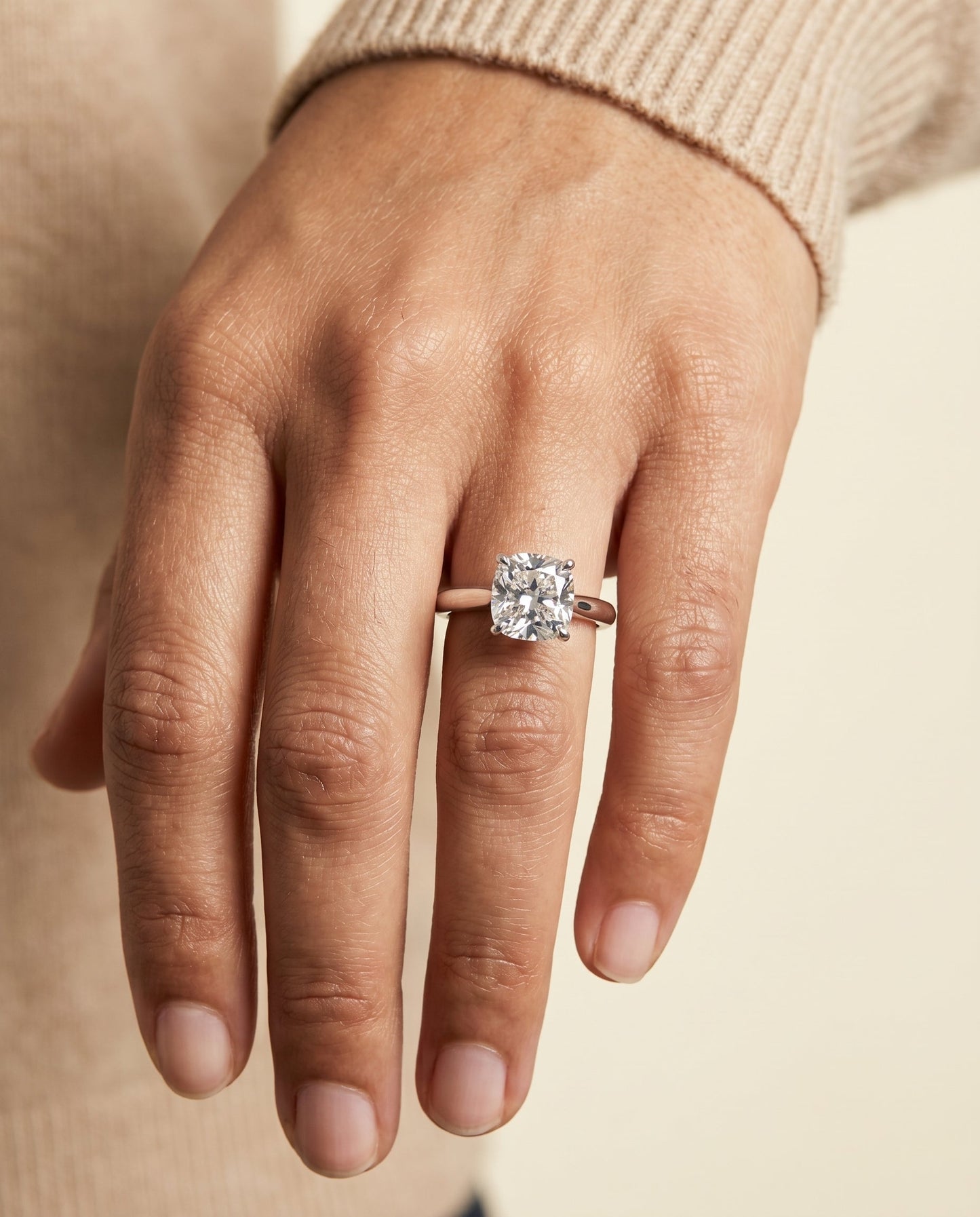Gladys Select Solitaire Cushion Cut Lab Diamond Engagement Ring in 18K White Gold, shown on hand | RockHer
