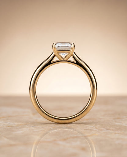 The Gladys Pinched Cathedral Solitaire Emerald Cut Engagement Ring Setting in 18K Yellow Gold