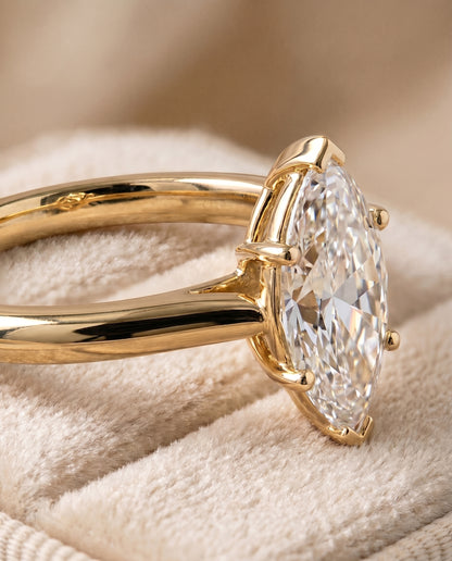 The Gladys Pinched Cathedral Solitaire Marquise Engagement Ring Setting in 18K Yellow Gold