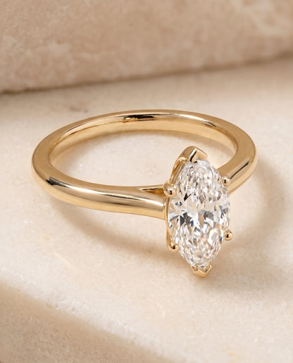 The Gladys Pinched Cathedral Solitaire Marquise Engagement Ring Setting in 18K Yellow Gold