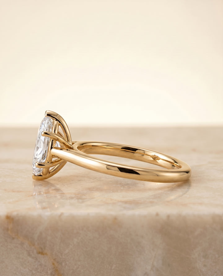 The Gladys Pinched Cathedral Solitaire Marquise Engagement Ring Setting in 18K Yellow Gold