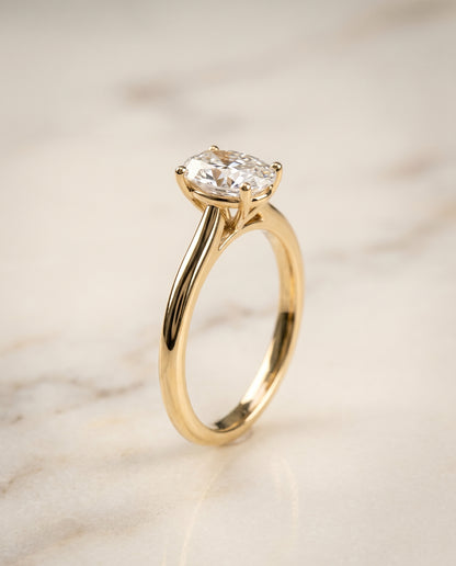 The Gladys Pinched Cathedral Solitaire Oval Engagement Ring Setting in 18K Yellow Gold