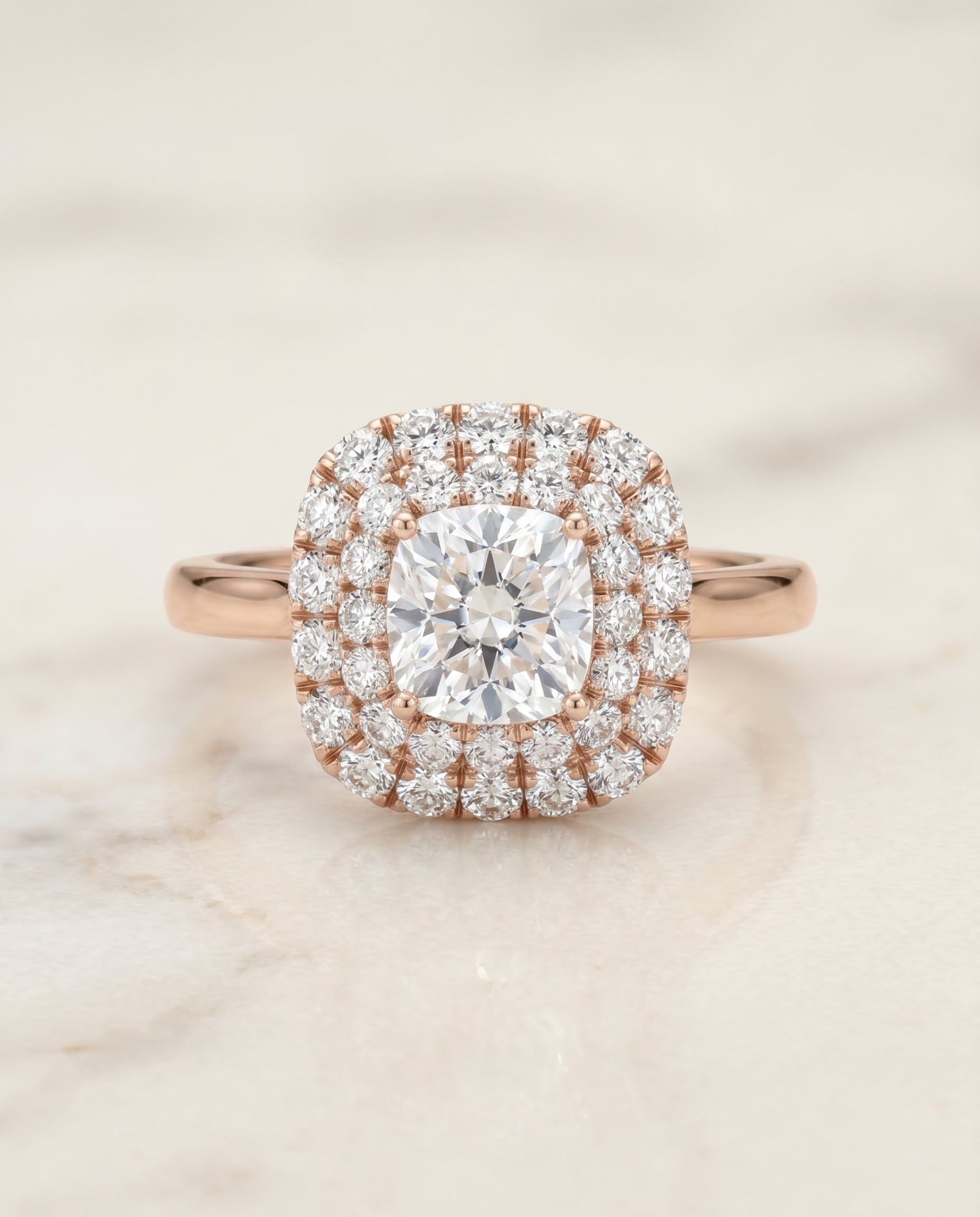 Stair Step Double Halo Cushion, in 14K Rose Gold, pave setting – angled view | RockHer