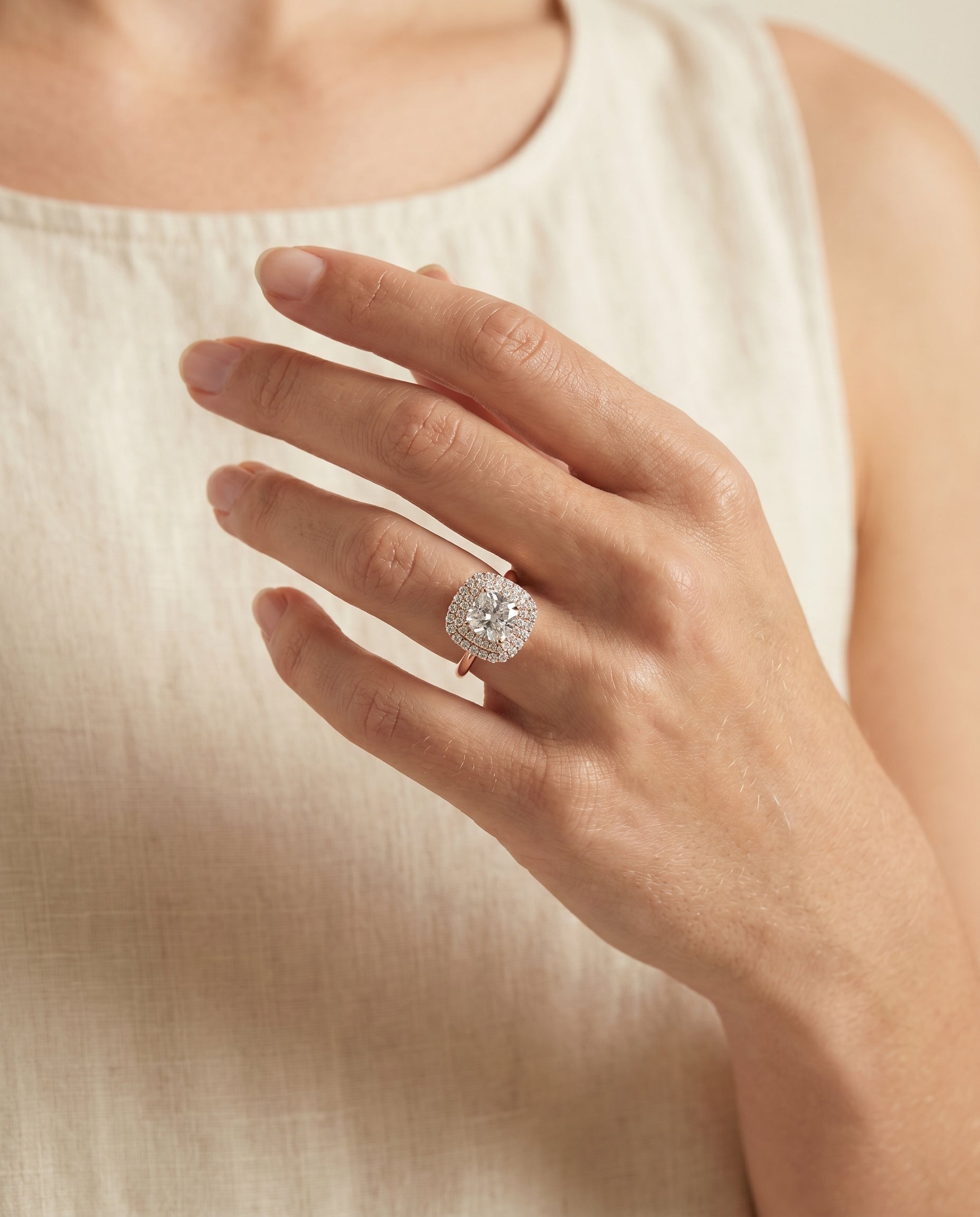 The Goldy engagement ring setting in 14K Rose Gold, stair double halo cut design | RockHer