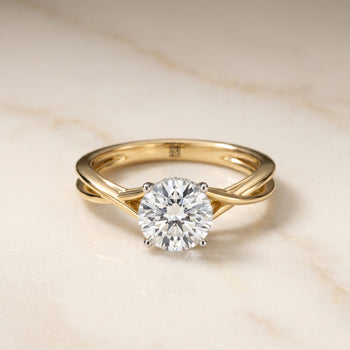 The Grace Solitaire Engagement Ring Setting for Round Diamonds in 18K Yellow Gold