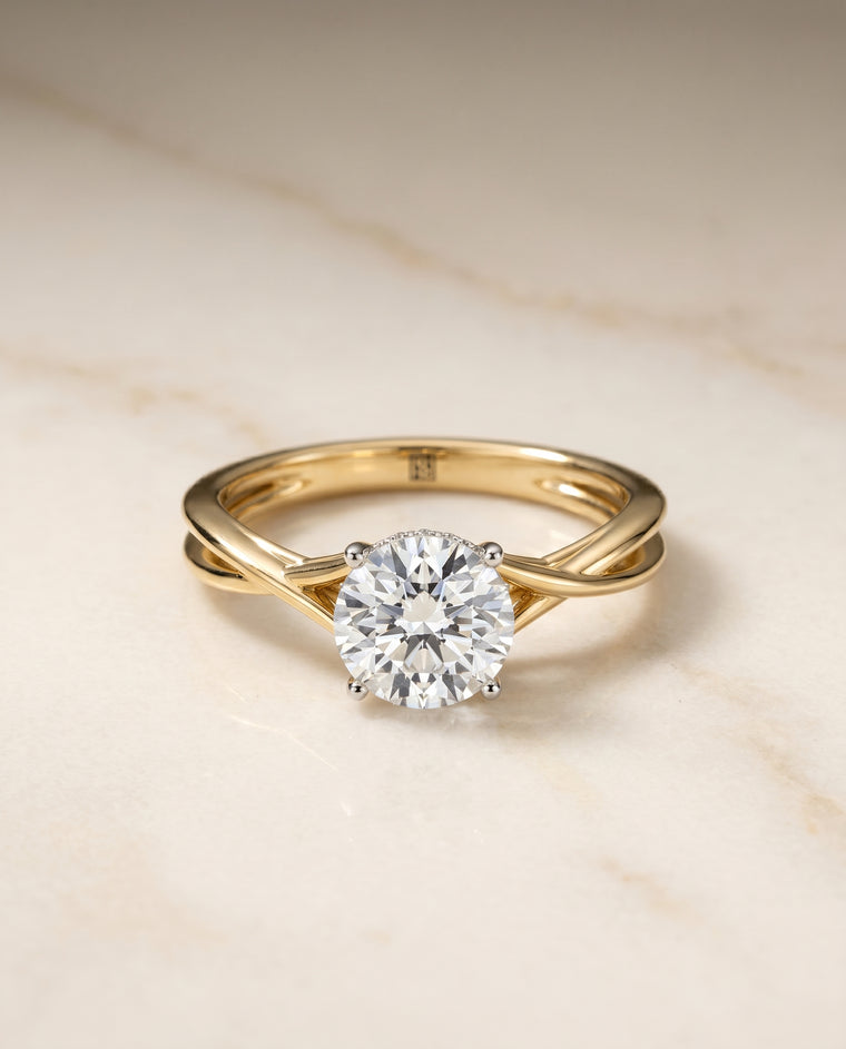 The Grace Solitaire Engagement Ring Setting for Round Diamonds in 18K Yellow Gold