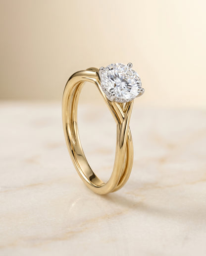 The Grace Solitaire Engagement Ring Setting for Round Diamonds in 18K Yellow Gold