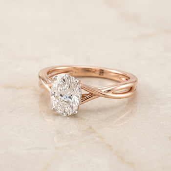 The Grace Twisted Shank Hidden Halo Solitaire Oval Engagement Ring Setting in 14K Rose Gold