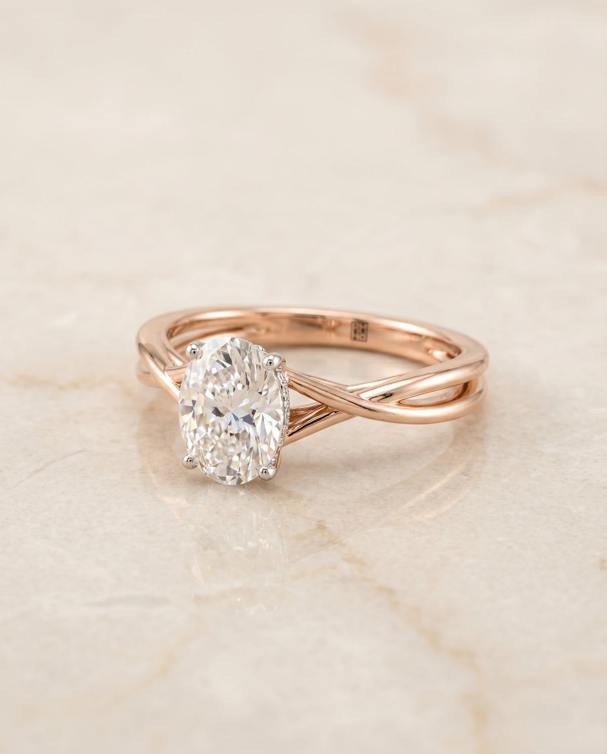 Grace Select Solitaire Oval Lab Diamond Engagement Ring in 14K Rose Gold, shown on hand, angled | RockHer