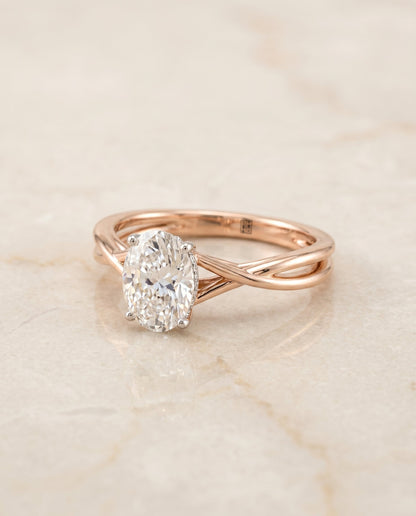Grace Select Solitaire Oval Lab Diamond Engagement Ring in 14K Rose Gold, shown on hand, angled | RockHer