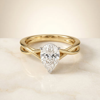 The Grace Twisted Shank Hidden Halo Solitaire Princess Cut Engagement Ring Setting in 18K Yellow Gold