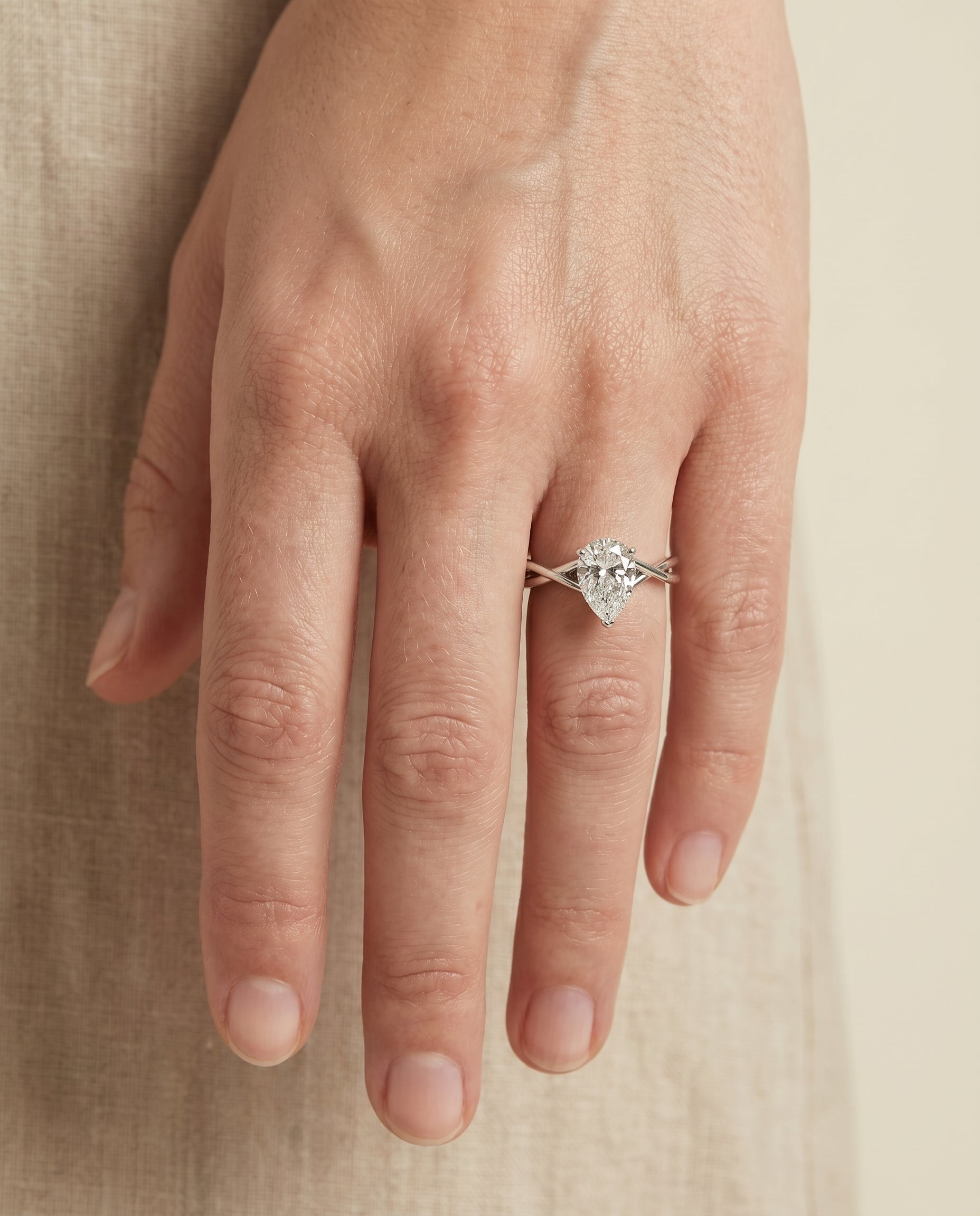 The Grace engagement ring setting in 18K White Gold, twisted shank hidden halo solitaire design | RockHer