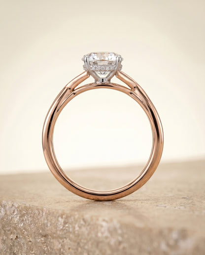 The Grace Twisted Shank Hidden Halo Solitaire Round Engagement Ring Setting in 14K Rose Gold