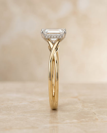 The Grace Twisted Shank Hidden Halo Solitaire Emerald Cut Engagement Ring Setting in 18K Yellow Gold
