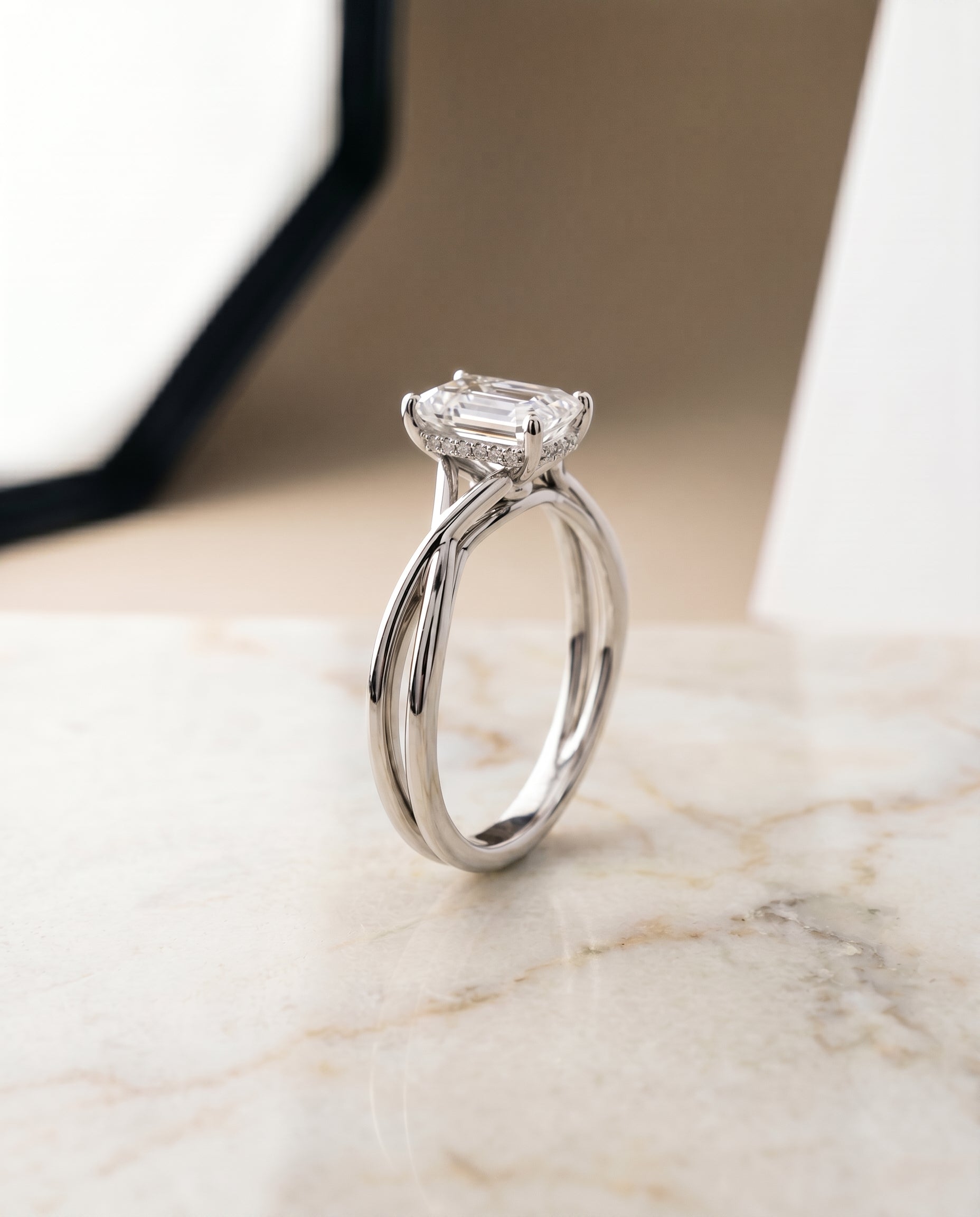 Twisted Shank Hidden Halo Solitaire Cut styling on The Grace emerald engagement ring setting | RockHer
