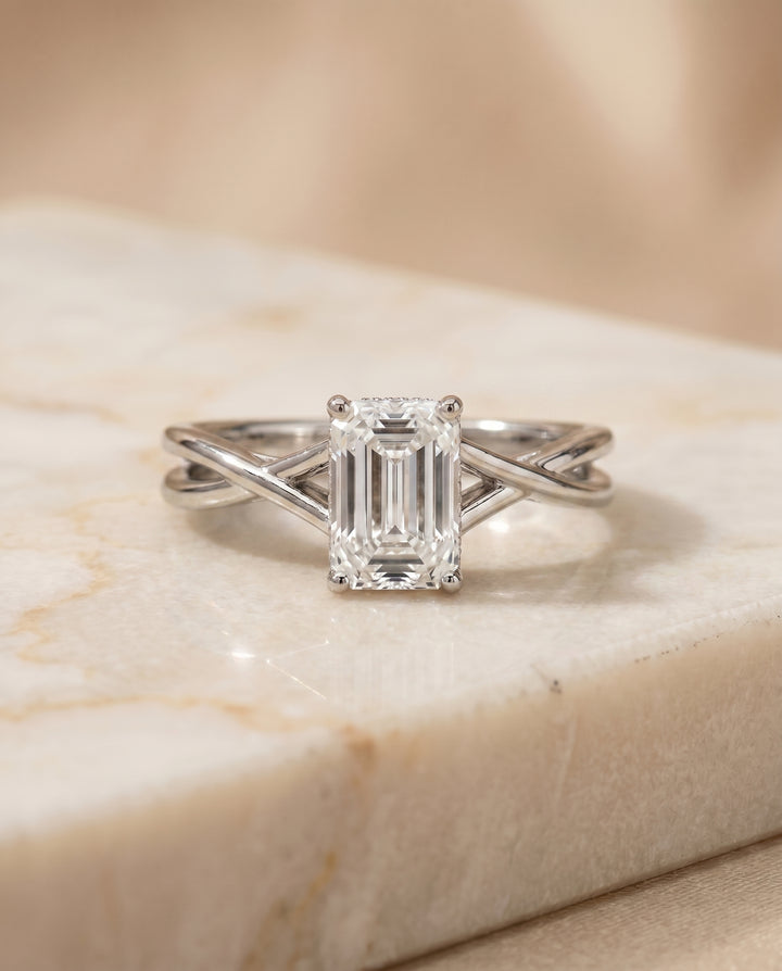 The Grace Twisted Shank Hidden Halo Solitaire Emerald Cut Engagement Ring Setting in Platinum