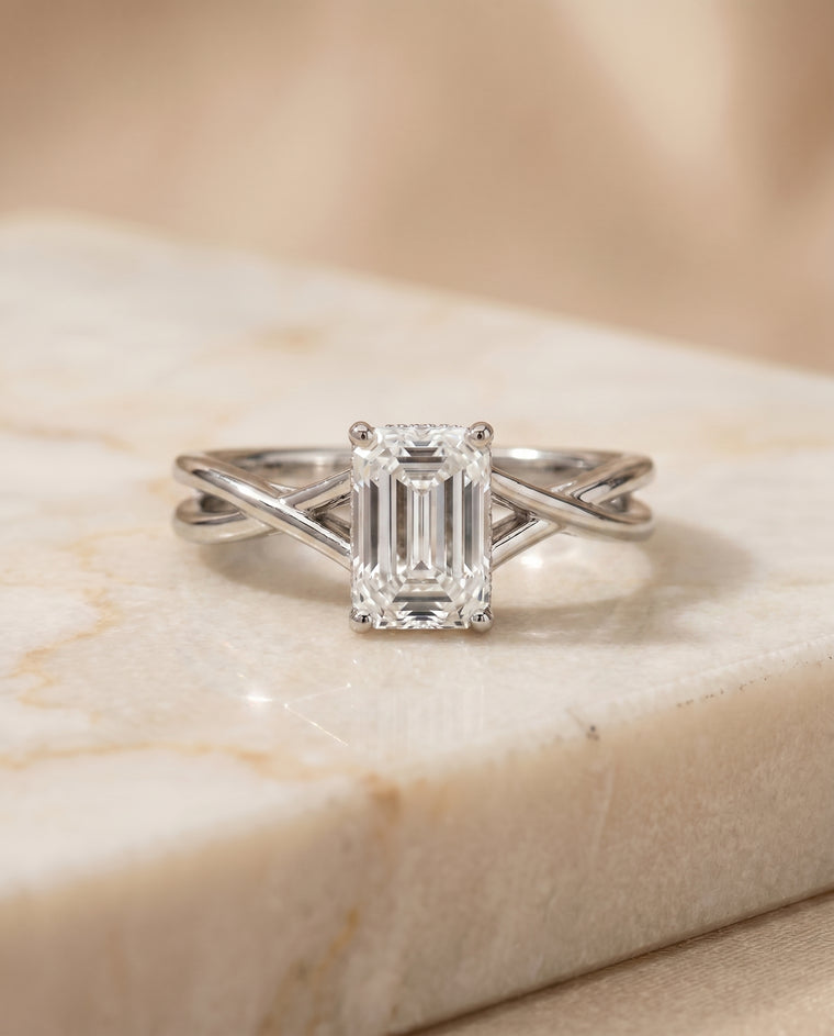The Grace Twisted Shank Hidden Halo Solitaire Emerald Cut Engagement Ring Setting in 18K White Gold