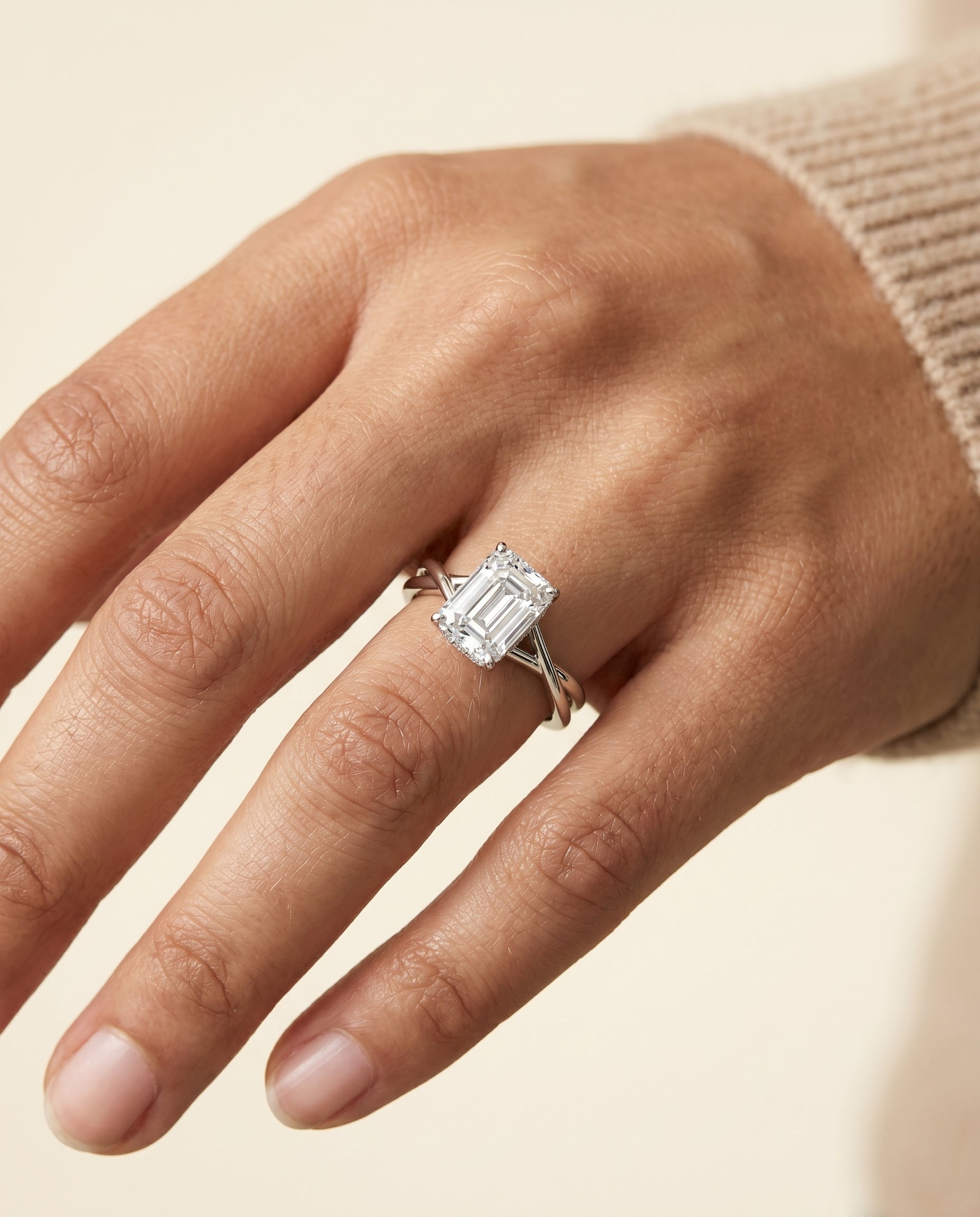 The Grace engagement ring setting in Platinum, twisted shank hidden halo solitaire cut design | RockHer