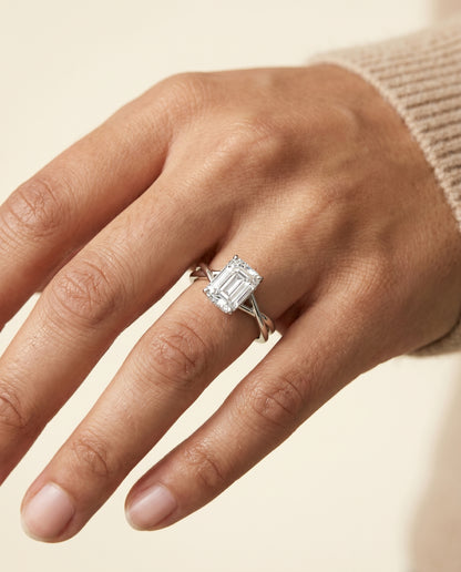 The Grace Twisted Shank Hidden Halo Solitaire Emerald Cut Engagement Ring Setting in 18K White Gold