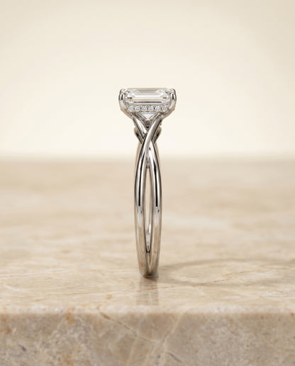 The Grace Twisted Shank Hidden Halo Solitaire Emerald Cut Engagement Ring Setting in 18K White Gold