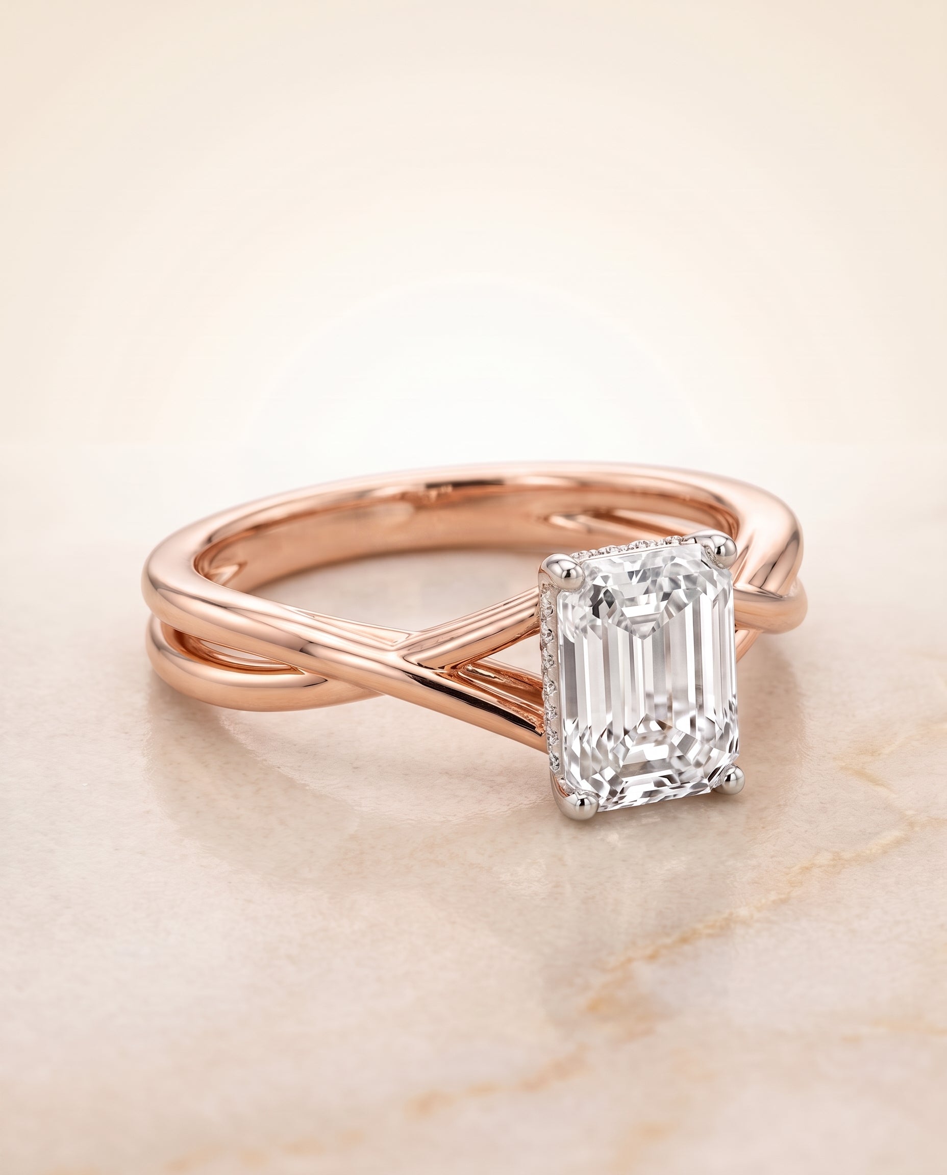 The Grace Twisted Shank Hidden Halo Solitaire Emerald Cut Engagement Ring Setting in 14K Rose Gold