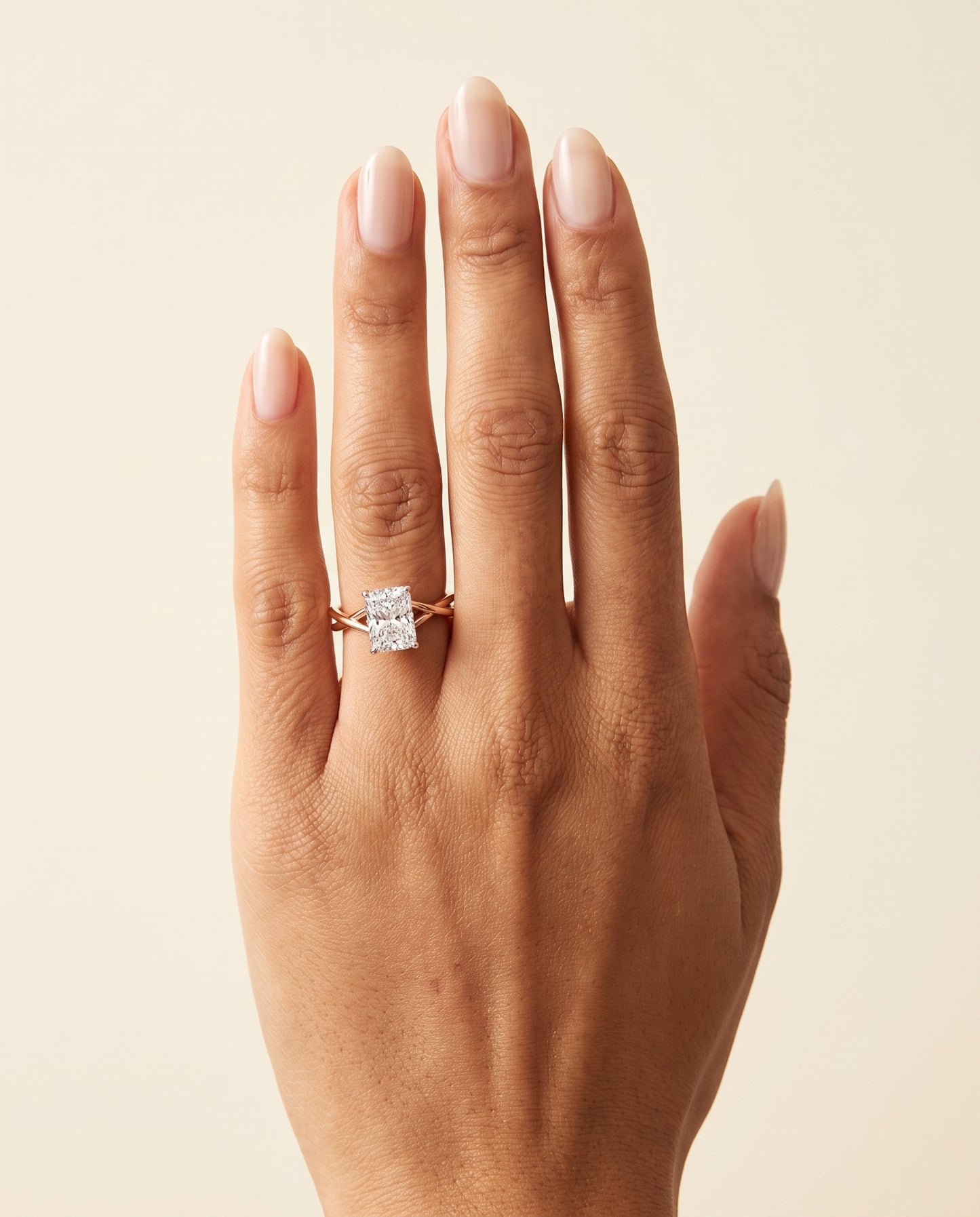 The Grace Twisted Shank Hidden Halo Solitaire Radiant Cut Engagement Ring Setting in 14K Rose Gold
