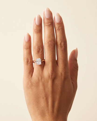 The Grace Twisted Shank Hidden Halo Solitaire Radiant Cut Engagement Ring Setting in 14K Rose Gold