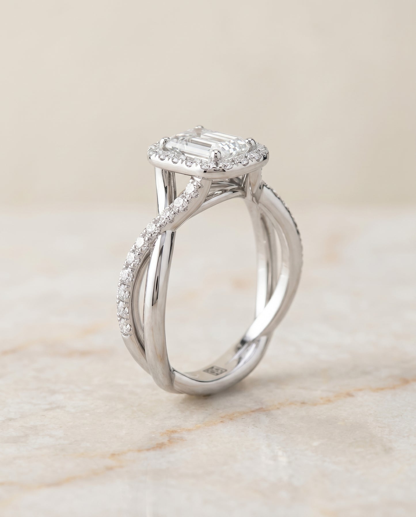 European Cut, Twisted Vine Halo Emerald, in Platinum, pave setting – angled view | RockHer