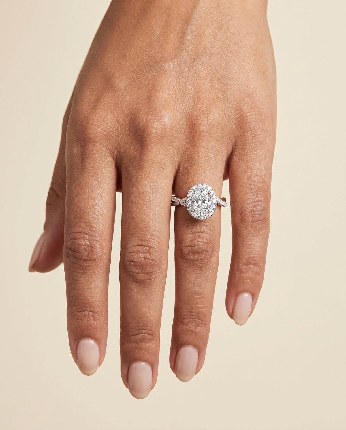 The Harmony Twisted Vine Halo Oval Engagement Ring Setting in Platinum