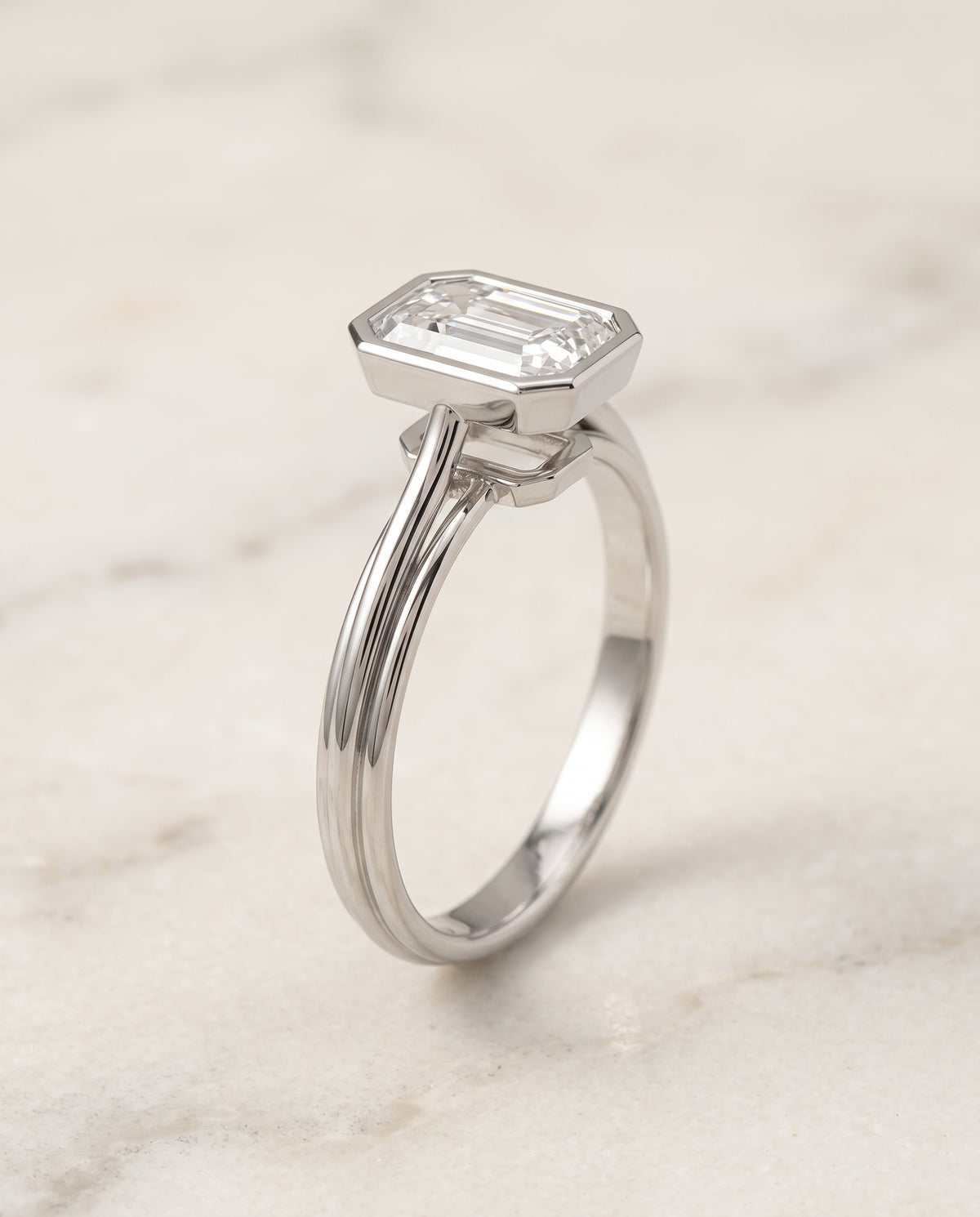 The Hayley Bezel Cathedral Solitaire Emerald Cut Engagement Ring Setting in Platinum