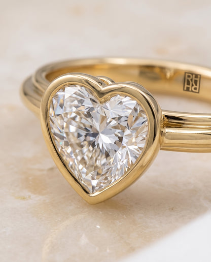 The Hayley Bezel Cathedral Solitaire Heart Engagement Ring Setting in 18K Yellow Gold
