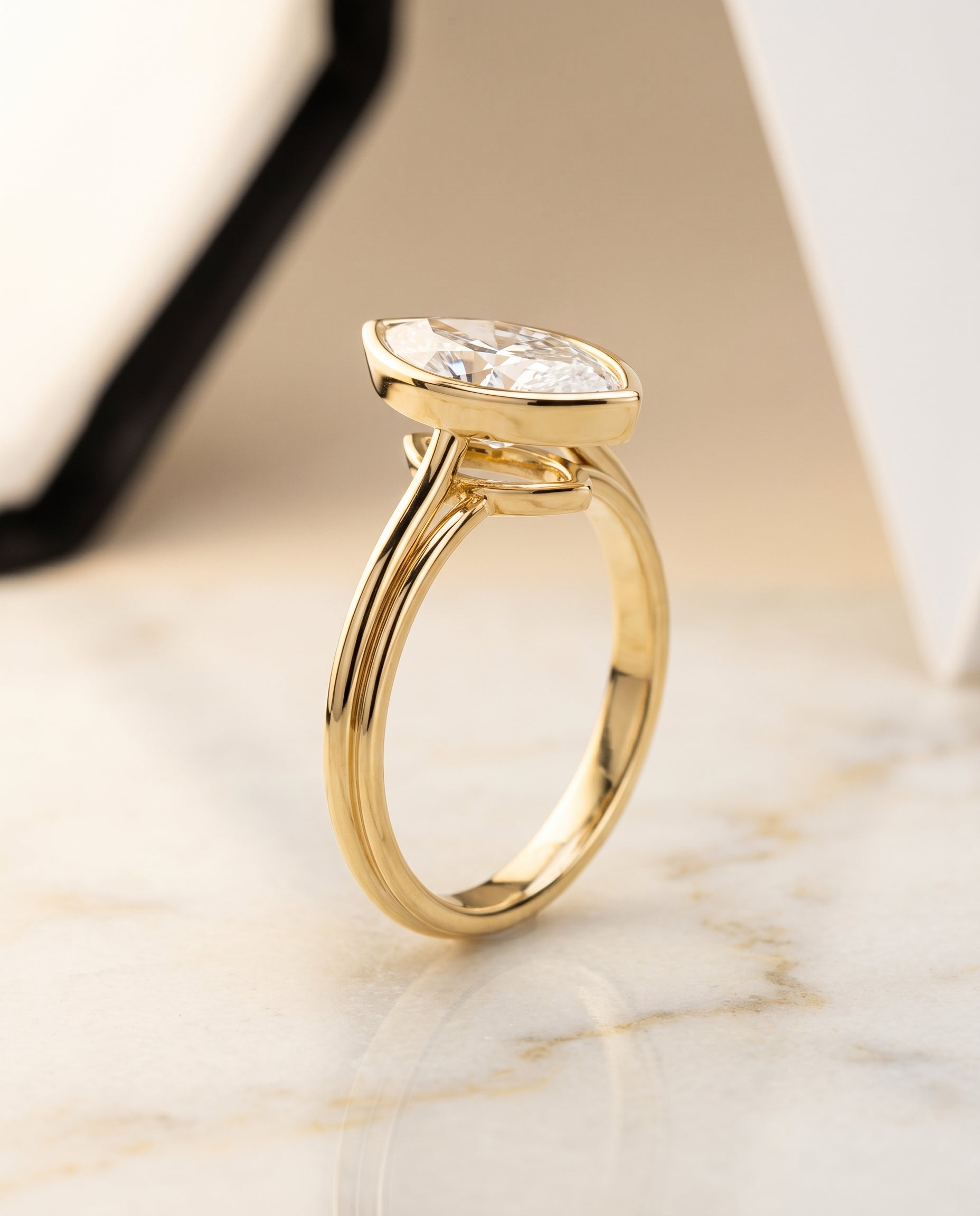 Bezel Cathedral Solitaire styling on The Hayley marquise engagement ring setting | RockHer