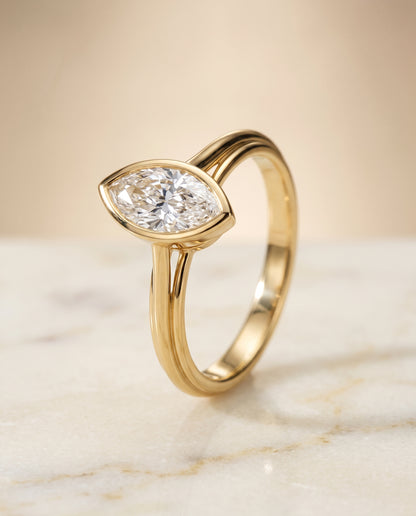 The Hayley Bezel Cathedral Solitaire Marquise Engagement Ring Setting in 18K Yellow Gold