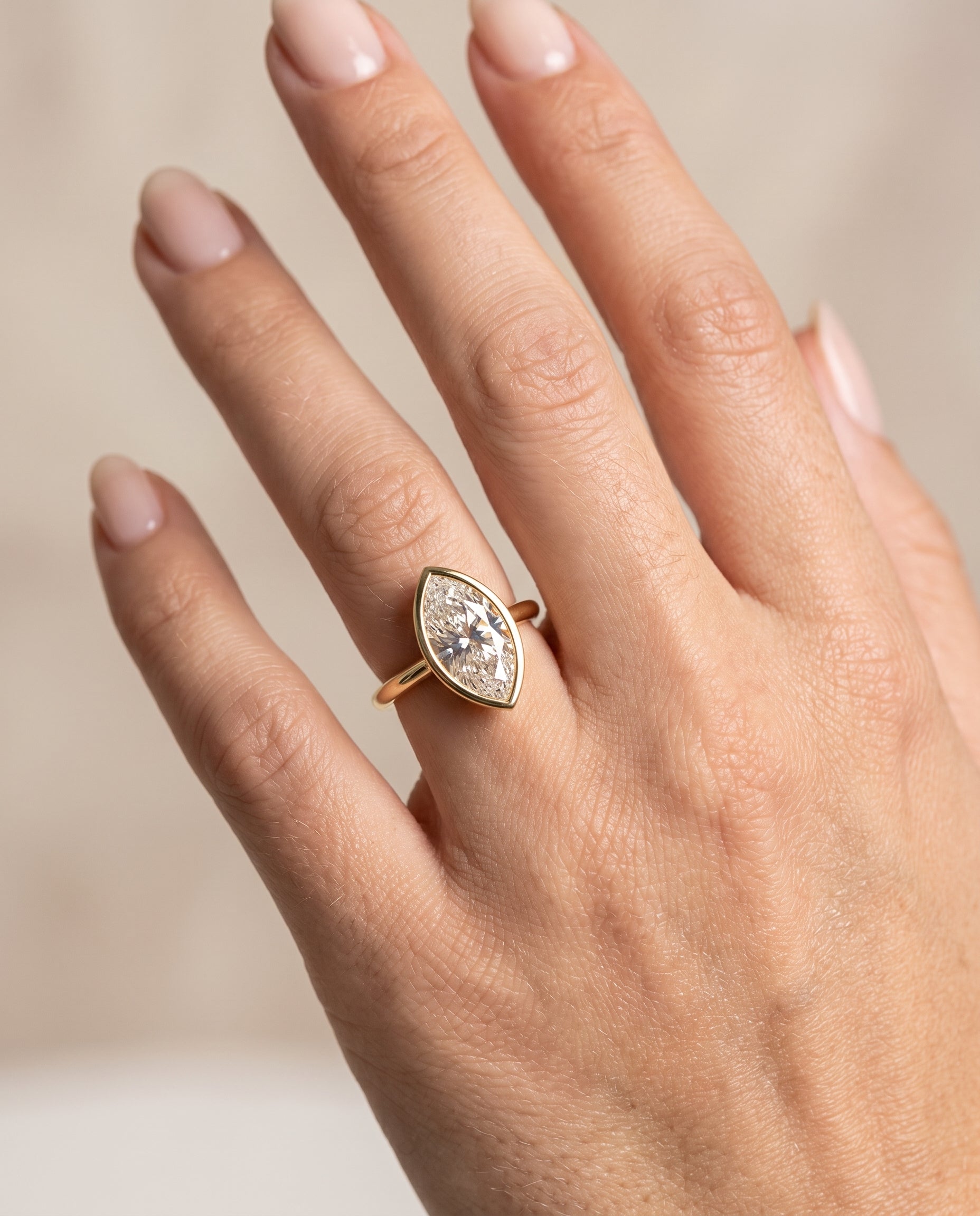 The Hayley engagement ring setting in 18K Yellow Gold, bezel cathedral solitaire design | RockHer