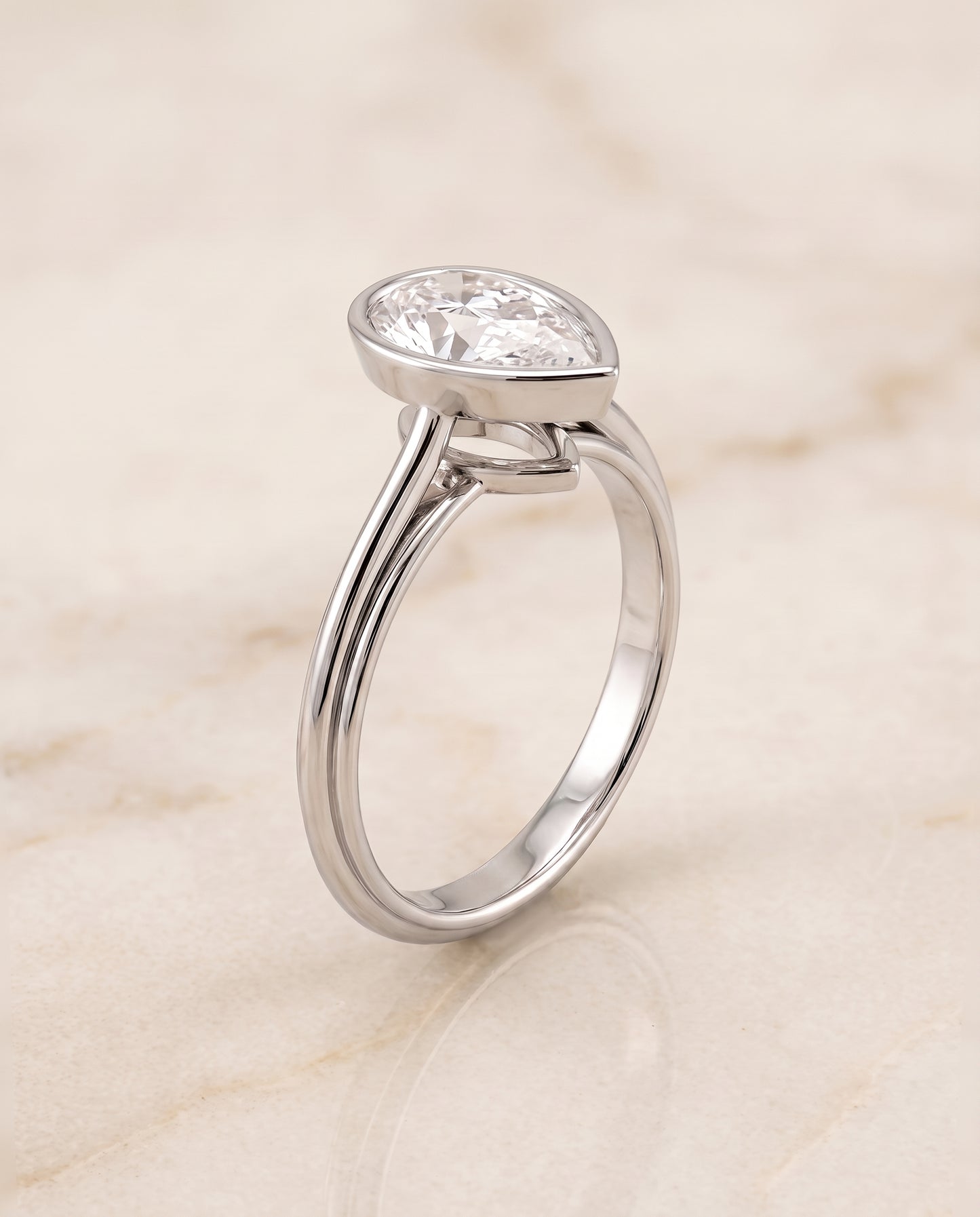 The Hayley Bezel Cathedral Solitaire Pear Engagement Ring Setting in Platinum
