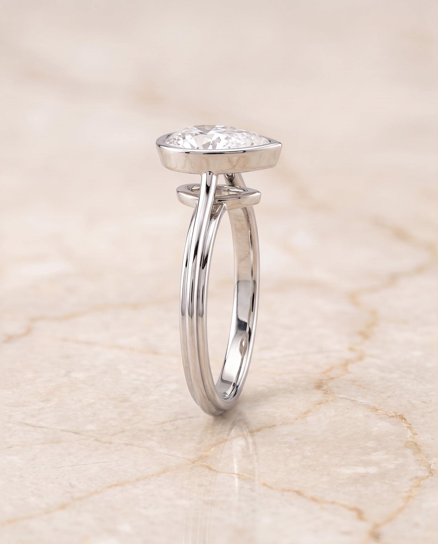 The Hayley Bezel Cathedral Solitaire Pear Engagement Ring Setting in Platinum