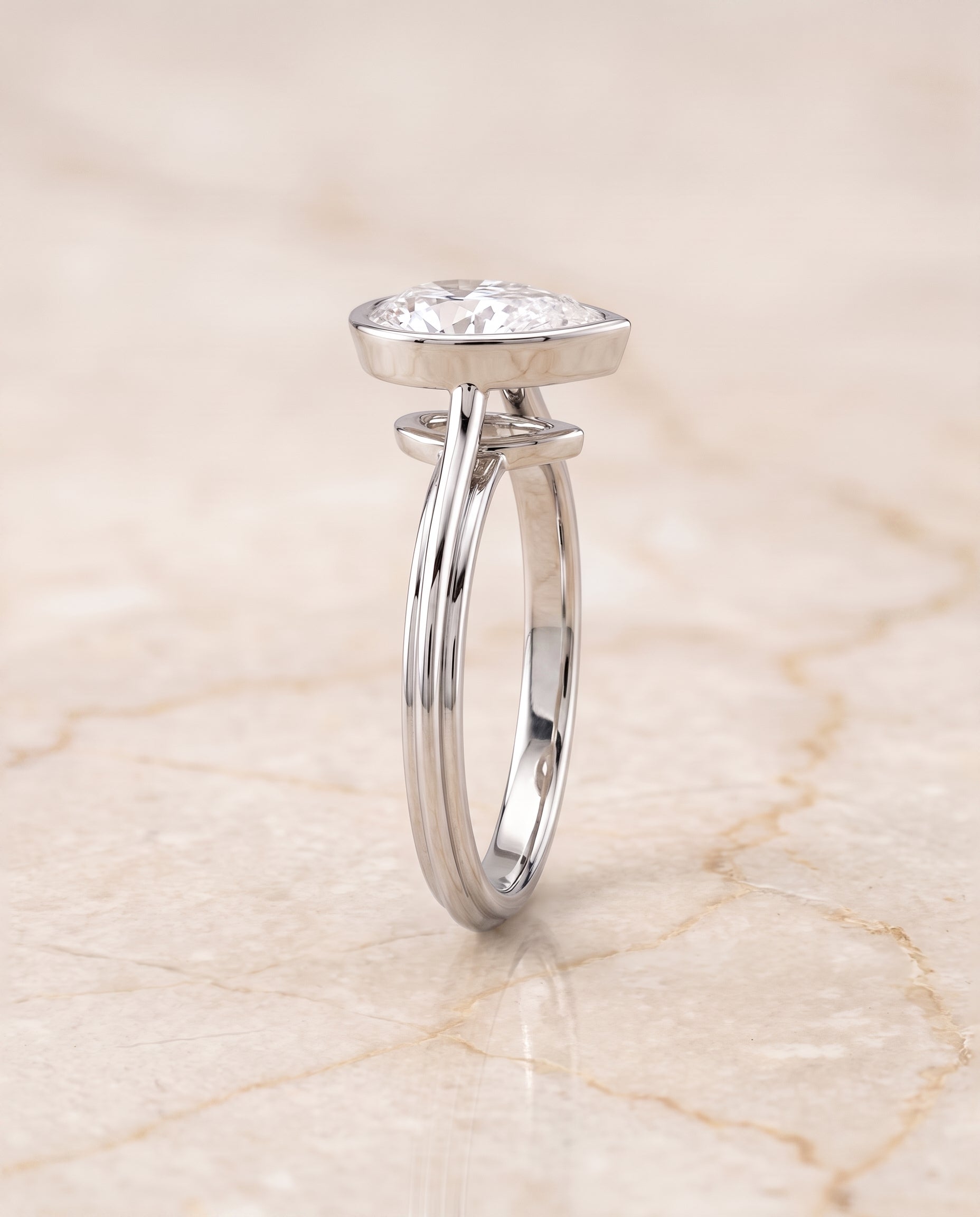 The Hayley Bezel Cathedral Solitaire Pear Engagement Ring Setting in Platinum