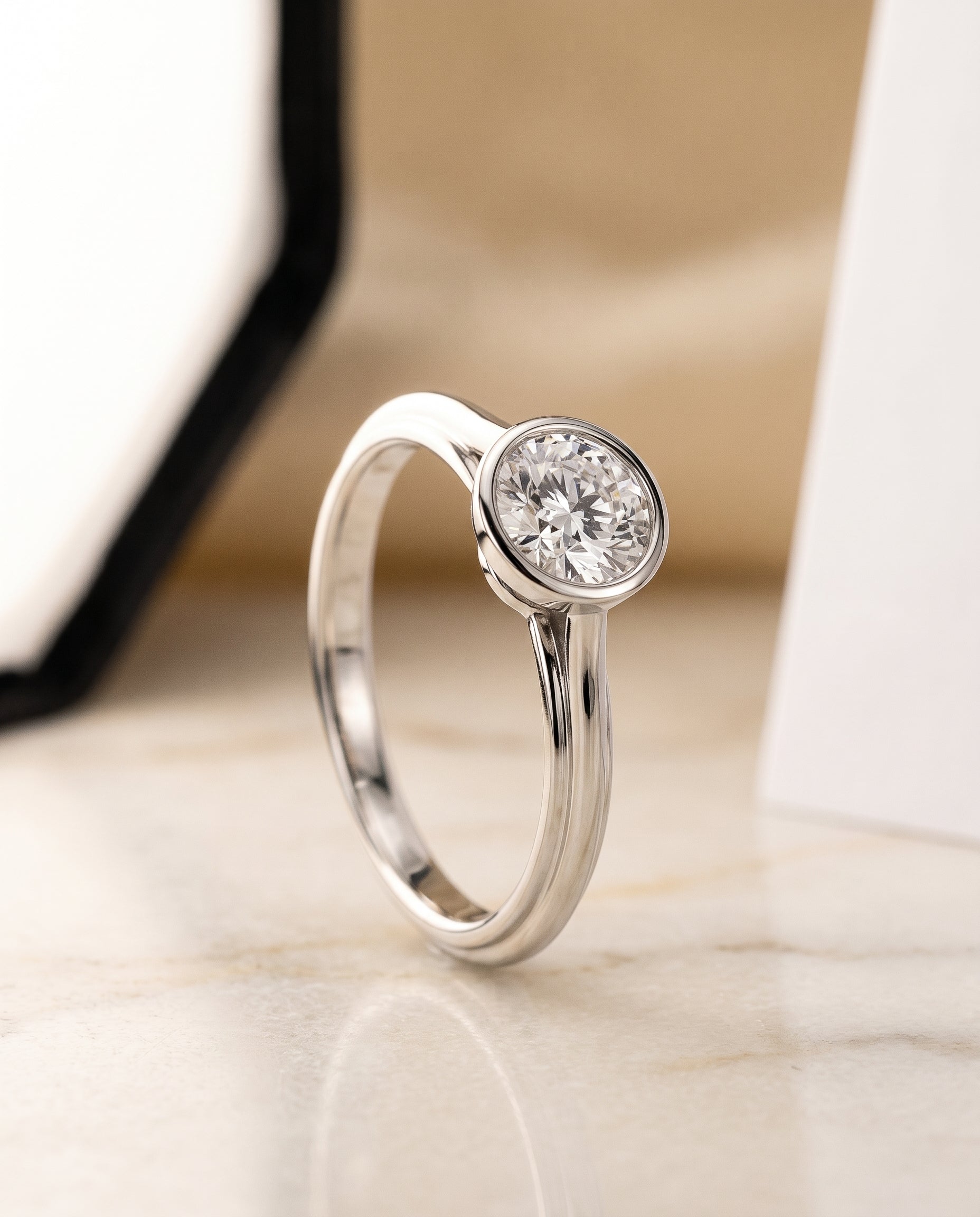 Bezel Cathedral Solitaire styling on The Hayley round engagement ring setting | RockHer