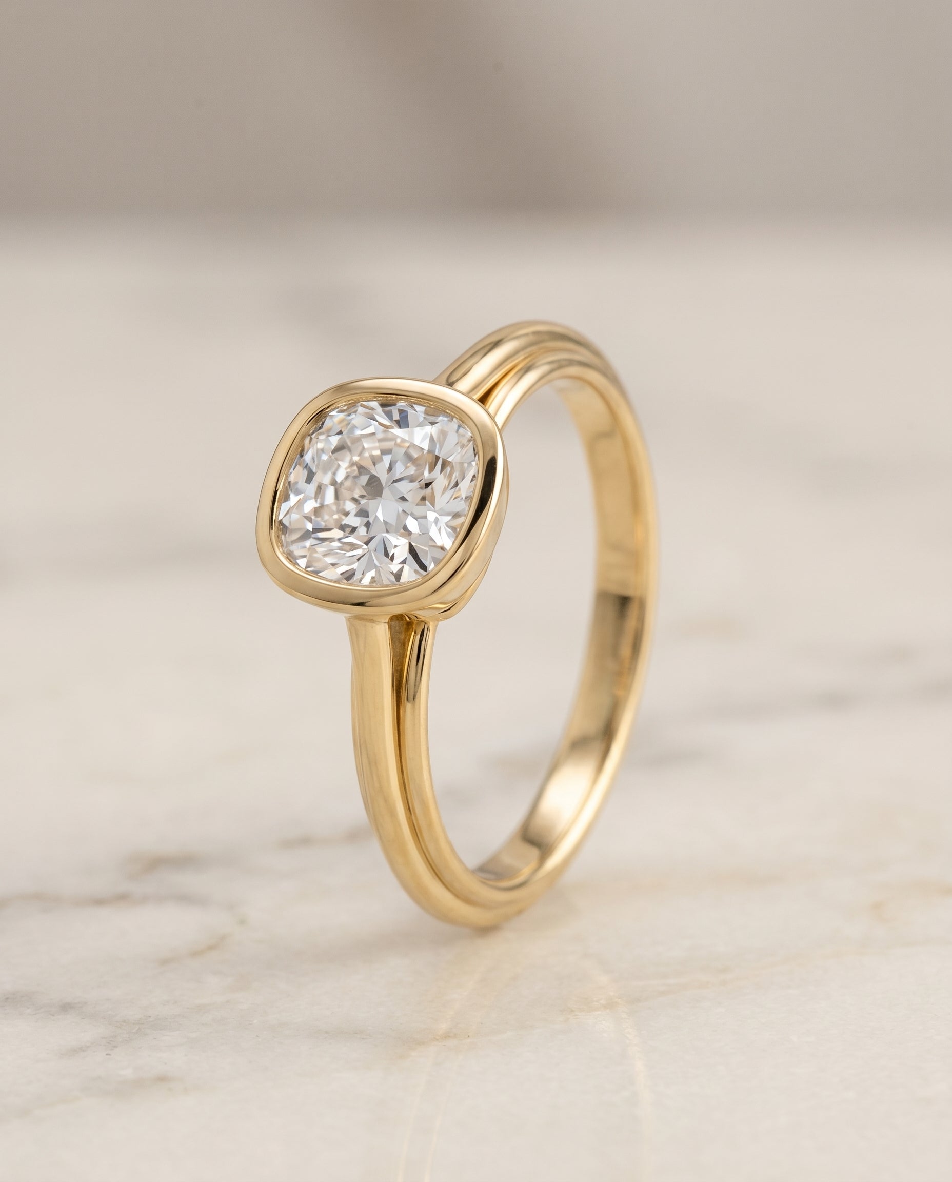 Bezel Cathedral Solitaire Cut styling on The Hayley cushion engagement ring setting | RockHer