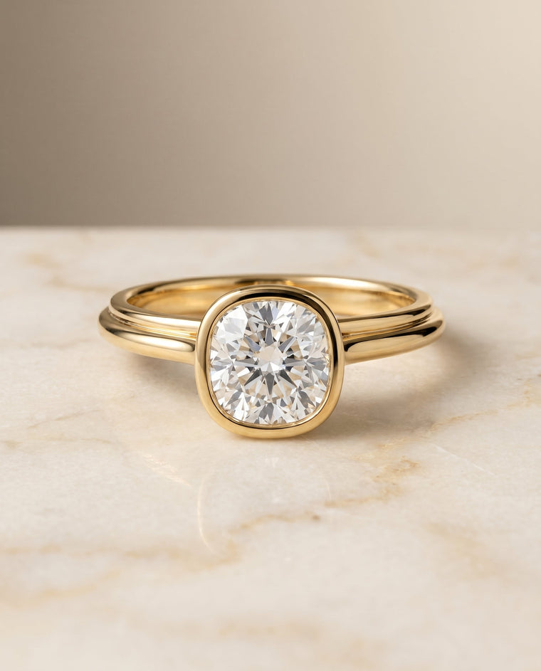 The Hayley Select Bezel Solitaire Cushion Cut Lab Diamond Engagement Ring in 18K Yellow Gold