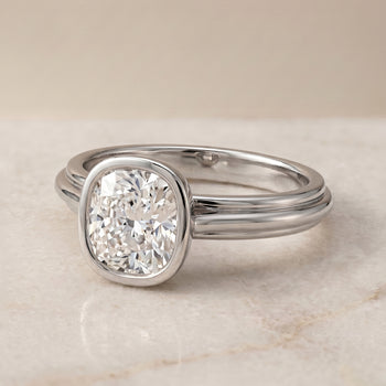 The Hayley Bezel Cathedral Solitaire Cushion Cut Engagement Ring Setting in Platinum