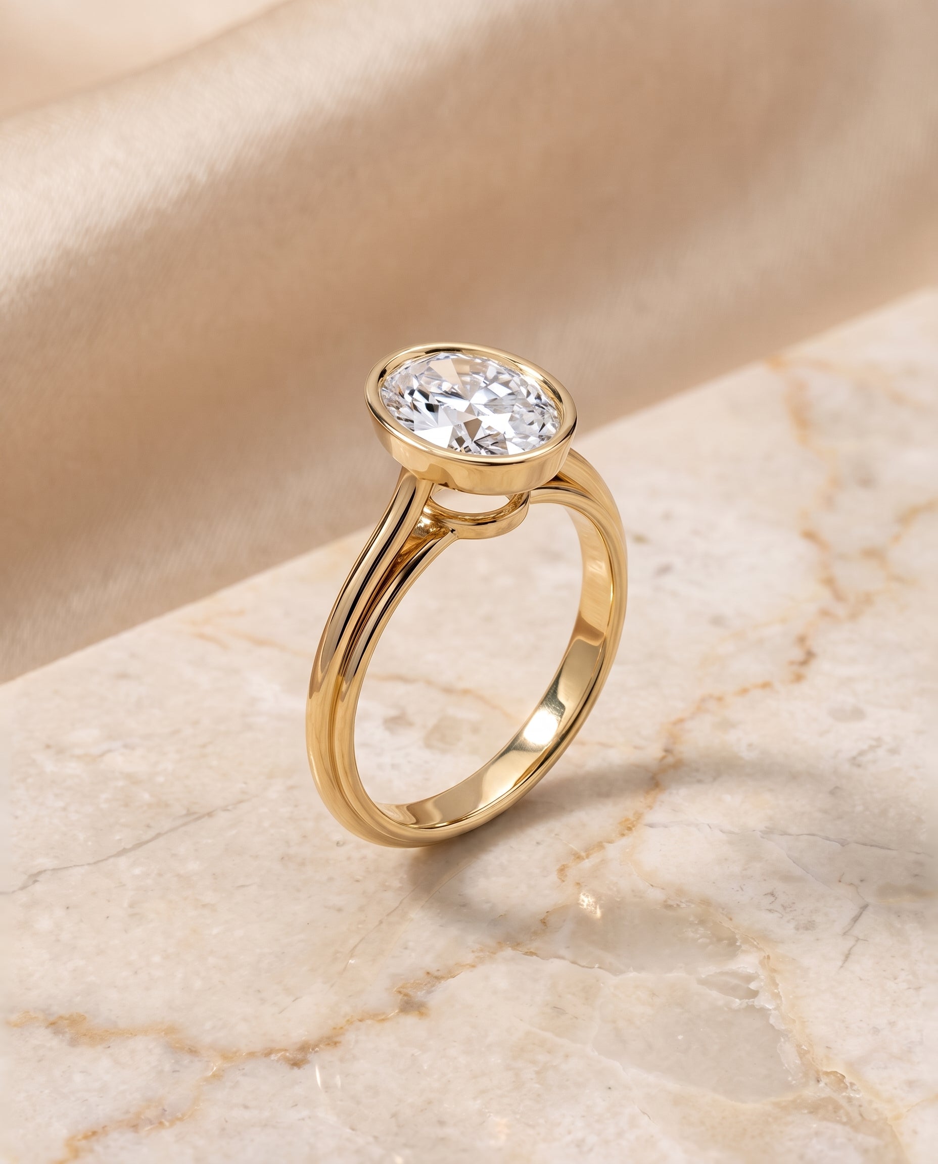 The Hayley Bezel Cathedral Solitaire Oval Engagement Ring Setting in 18K Yellow Gold