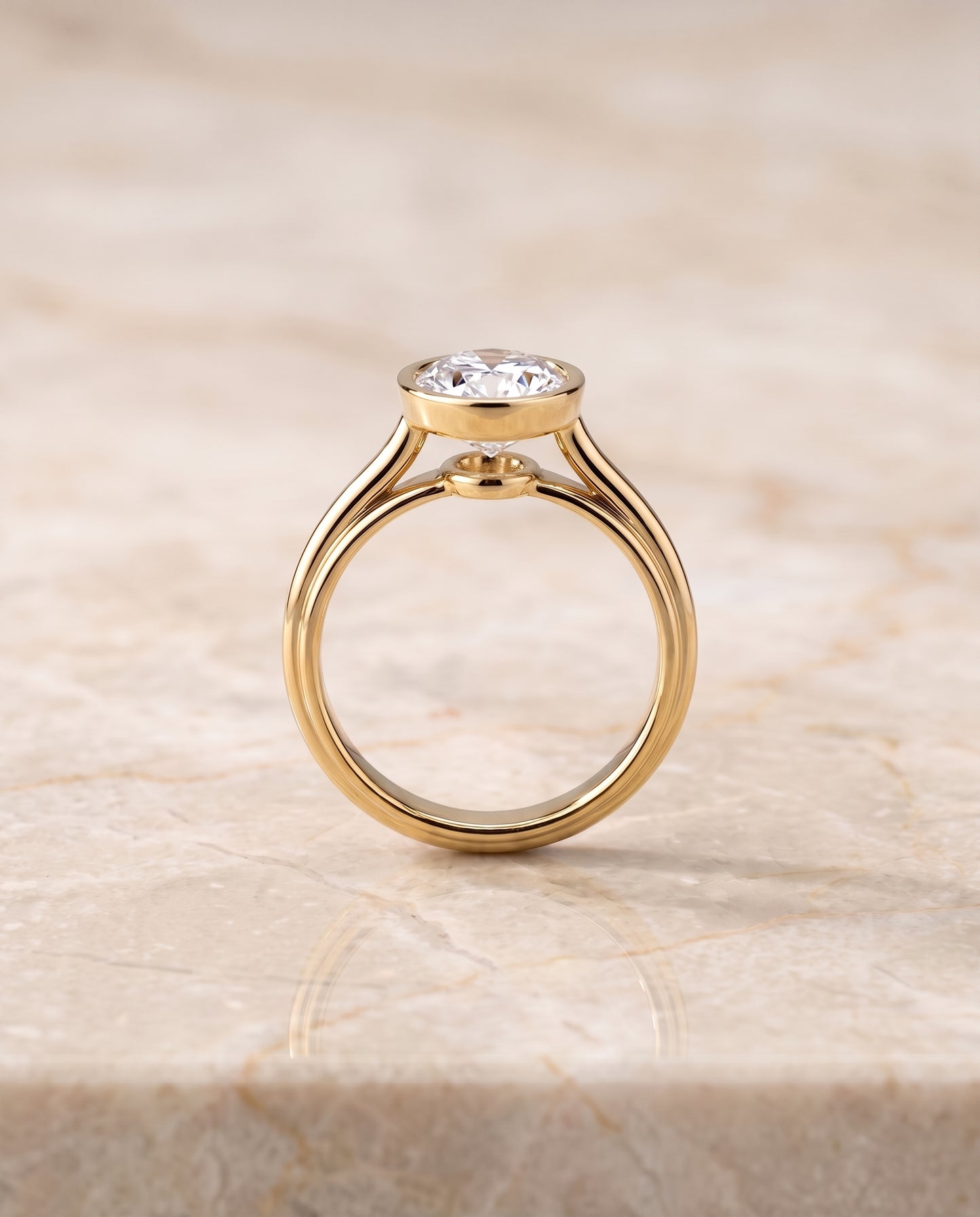 The Hayley Bezel Cathedral Solitaire Oval Engagement Ring Setting in 18K Yellow Gold
