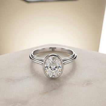 The Hayley Bezel Cathedral Solitaire Oval Engagement Ring Setting in Platinum