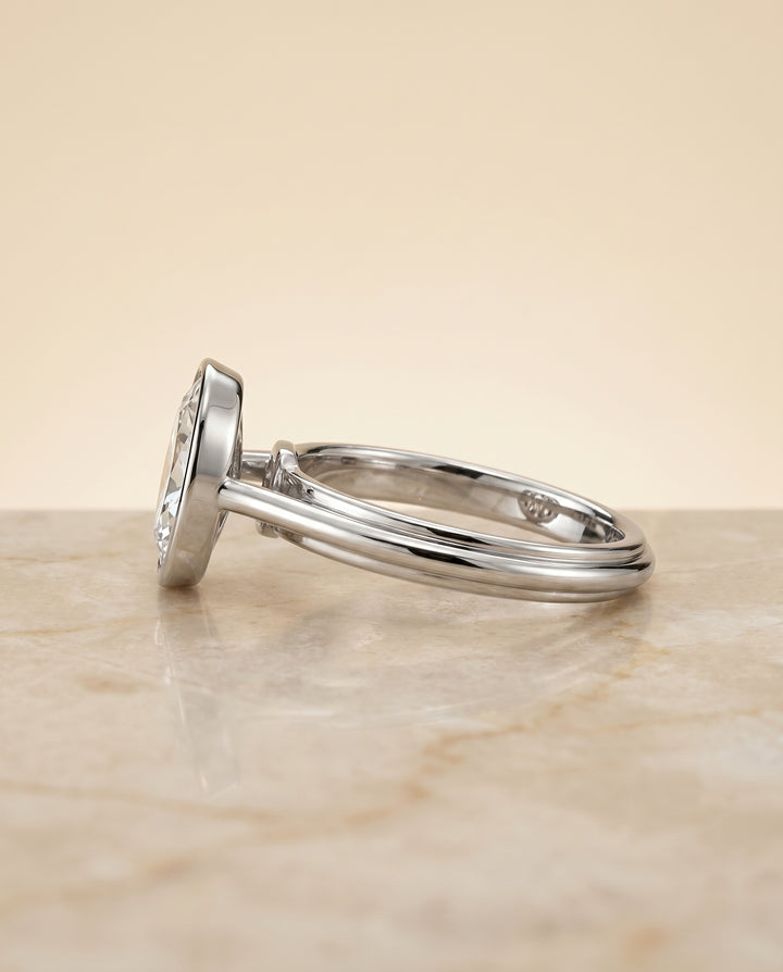 The Hayley Bezel Solitaire Engagement Ring Setting for Oval Diamonds in Platinum